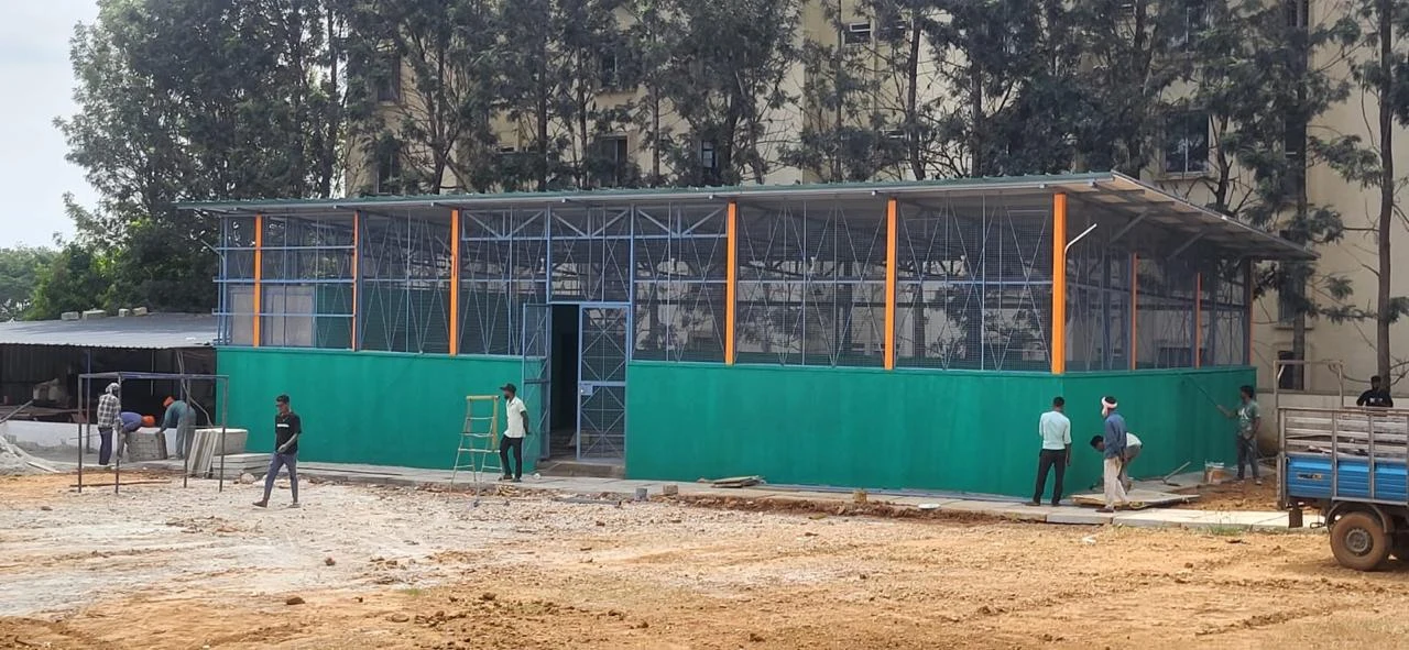Steel frame building and boundary works under construction